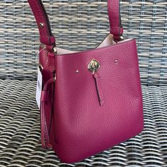 Kate Spade Marti Small Bucket 8.75''H X 8.25''W X 5.75''D Handle Drop: 19.5" Pebbled Leather Micro Suede Lining Foil Embossed Logo Crossbody With Turn Lock Closure Center Zip Compartment Dust Bag Not Included Imported Style # Wkru7063 Purple Bucket Shoulder Bag With Detachable Strap, Chic Purple Bucket Shoulder Bag, Formal Purple Bag With Silver-tone Hardware, Chic Purple Bag With Silver-tone Hardware, Kate Spade Purple Bags, Formal Purple Shoulder Bag With Adjustable Strap, Kate Spade Purple Shopping Bag, Kate Spade Purple Evening Bag, Kate Spade Purple Formal Bag