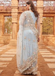 Embellished Blue Anarkali Pre-draped Saree, Traditional Embellished Chanderi Pre-draped Saree, Blue Embellished Semi-stitched Pre-draped Saree, Blue Embellished Saree For Eid, Semi-stitched Net Pre-draped Saree For Diwali, Navratri Embellished Organza Saree, Blue Embellished Saree For Navratri, Semi-stitched Embellished Blue Saree, Embellished Blue Saree For Diwali