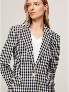 Tommy Hilfiger women's blazer. Formal styling takes a playful turn with this single-breasted blazer, cut to a slim fit from lightweight breathable seersucker.  Material: 50% Sustainable Modal (smd), 46% Cotton, 4% Elastane. Tommy Hilfiger Tailored Single Breasted Blazer, Tommy Hilfiger Tailored Blazer For Spring, Tommy Hilfiger Tailored Blazer With Notch Lapel, Tommy Hilfiger Single-breasted Business Blazer, Tommy Hilfiger Notch Lapel Blazer For Business Casual, Tommy Hilfiger Tailored Workwear Blazer, Tommy Hilfiger Notch Lapel Blazer For Work, Tommy Hilfiger Blazer With Notch Lapel For Work, Tommy Hilfiger Single Breasted Business Blazer