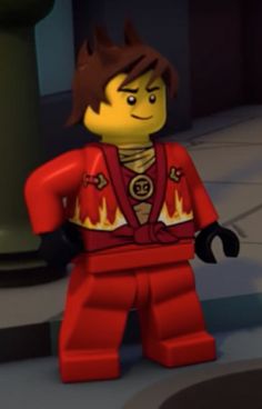 the lego movie character is standing in front of a fire hydrant