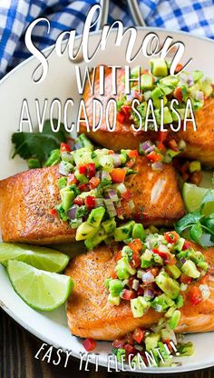 salmon with avocado salsa on a white plate