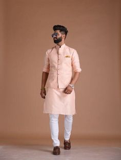 Important Instrucitons : We request you to kindly calculate the processing time of your order after the mutual confirmation on Bespoke measurements between us has taken place (either via message , e mail or form) Men can wear Half-Jackets and style them in many different ways. Want to look traditional? Great! Wear a Half Jodhpuri Jacket with your Mens Kurta and Pajama. Want to wear it to a party? Try Half Jodhpuri Jacket with Trousers. If you are all about comfort this summer, then these Half Ja Pink Kurta For Reception And Transitional Season, Pink Fitted Nehru Jacket, Pink Bandhgala With Chikankari Embroidery, Pink Kurta With Pallu For Reception, Pink Reception Kurta With Pallu, Fitted Bollywood Style Pink Nehru Jacket, Wedding Nehru Jacket With Gota Work And Long Sleeves, Festive Pink Nehru Jacket With Resham Embroidery, Pink Nehru Jacket For Festive Occasions