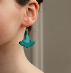 These turquoise earrings feature a stylised art deco scalloped design which has been hand painted to bring out verdigris tones of green, turquoise and jade green.  Each one is unique, hand made and no two are quite the same!  This piece of handmade jewellery comes packaged in a nice recycled gift box with a handmade tag, all ready to give or keep. 🖤 FASTER SHIPPING 🖤 Need this fast? We offer a Faster Shipping option here: https://www.etsy.com/uk/listing/100107311/faster-shipping-priority-post- Blue Patina Earrings For Gift, Artistic Turquoise Earrings For Gift, Elegant Green Patina Earrings, Patina Drop Earrings As Gift, Elegant Patina Earrings, Elegant Patina Earrings For Gifts, Stylised Art, Loki Cosplay, Scalloped Design