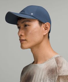 Sunny days make for great runs. Keep the glare out of your eyes with this lightweight running hat. Designed for Run. Reflective details. Adjustable back closure for a custom fit. 'Hand wash cold', 'Do not bleach', 'Lay flat to dry', 'Do not iron', 'Do not dry clean', 'Imported'. Inner front panel: 58% Nylon, 27% Polyester, 9% Lycra elastane, 6% X-static nylon. Sweat band: 58% Nylon, 27% Polyester, 9% Lycra elastane, 6% X-static nylon. Body: 86% Recycled polyester, 14% Elastane. Running Hats, Free Running, Custom Fit, Bleach, Sunny Days, Sunnies, Baseball Hats, Running, Hats