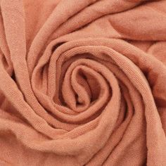 a close up view of an orange fabric