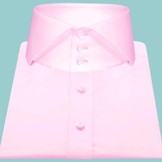 "High Cutaway Collar Shirt Tailor-Made On Order shirt 𝘈 𝘩𝘪𝘨𝘩 𝘤𝘰𝘭𝘭𝘢𝘳 𝘴𝘩𝘪𝘳𝘵 𝘪𝘴 𝘢 𝘤𝘭𝘢𝘴𝘴𝘪𝘤 𝘢𝘯𝘥 𝘵𝘪𝘮𝘦𝘭𝘦𝘴𝘴 𝘴𝘵𝘺𝘭𝘦 𝘵𝘩𝘢𝘵 𝘢𝘥𝘥𝘴 𝘢 𝘵𝘰𝘶𝘤𝘩 𝘰𝘧 𝘴𝘰𝘱𝘩𝘪𝘴𝘵𝘪𝘤𝘢𝘵𝘪𝘰𝘯 𝘵𝘰 𝘢𝘯𝘺 𝘰𝘶𝘵𝘧𝘪𝘵. 𝘛𝘩𝘪𝘴 𝘴𝘵𝘺𝘭𝘦 𝘧𝘦𝘢𝘵𝘶𝘳𝘦𝘴 𝘢 𝘤𝘰𝘭𝘭𝘢𝘳 𝘵𝘩𝘢𝘵 𝘴𝘵𝘢𝘯𝘥𝘴 𝘶𝘱 𝘢𝘯𝘥 𝘦𝘯𝘤𝘪𝘳𝘤𝘭𝘦𝘴 𝘵𝘩𝘦 𝘯𝘦𝘤𝘬, 𝘱𝘳𝘰𝘷𝘪𝘥𝘪𝘯𝘨 𝘢 𝘳𝘦𝘧𝘪𝘯𝘦𝘥 𝘢𝘯𝘥 𝘱𝘰𝘭𝘪𝘴𝘩𝘦𝘥 𝘭𝘰𝘰𝘬. 𝘐𝘵'𝘴 𝘢 𝘷𝘦𝘳𝘴𝘢𝘵𝘪𝘭𝘦 𝘱𝘪𝘦𝘤𝘦 𝘰𝘧 𝘤𝘭𝘰𝘵𝘩𝘪𝘯𝘨 𝘵𝘩𝘢𝘵 𝘤𝘢𝘯 𝘣𝘦 𝘸𝘰𝘳𝘯 𝘸𝘪𝘵𝘩 𝘢 𝘴𝘶𝘪𝘵 𝘧𝘰𝘳 𝘧𝘰𝘳𝘮𝘢𝘭 𝘰𝘤𝘤𝘢𝘴𝘪𝘰𝘯𝘴 𝘰𝘳 𝘥𝘳𝘦𝘴𝘴𝘦𝘥 𝘥𝘰𝘸𝘯 𝘸𝘪𝘵𝘩 𝘫𝘦𝘢𝘯𝘴 𝘧𝘰𝘳 𝘢 𝘤𝘢𝘴𝘶𝘢𝘭 𝘭𝘰𝘰𝘬. 𝘛𝘩𝘦 𝘩𝘪𝘨𝘩 𝘤𝘰𝘭𝘭𝘢𝘳 𝘢𝘭𝘴𝘰 𝘰𝘧𝘧𝘦𝘳𝘴 𝘢𝘥𝘥𝘪𝘵𝘪𝘰𝘯𝘢𝘭 𝘤𝘰𝘷𝘦𝘳𝘢𝘨𝘦 𝘢𝘯𝘥 𝘱𝘳𝘰𝘵𝘦𝘤𝘵𝘪𝘰𝘯 𝘢𝘨𝘢𝘪𝘯𝘴𝘵 Classic Tops With Detachable Collar For Work, Pink Business Shirt With Spread Collar, Classic Shirt With Button Closure, Semi-formal Pink Shirt With Spread Collar, Semi-formal Solid Shirt With Spread Collar, Pink Semi-formal Shirt With Spread Collar, Formal Pink Button-up Dress Shirt, Elegant Pink Button-up Dress Shirt, Classic Fitted Top With Detachable Collar