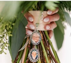 a woman holding a bouquet with flowers and pictures on it