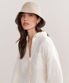 Linen Bucket Hat Natural Inspired by fisherman styles, our elevated take on the classic bucket hat is the summer’s definitive beach bag essential. 100% linen. Made in Portugal. | Jenni Kayne Women's Linen Bucket Hat Size Small/Medium Chic Curved Brim Bucket Hat For Day Out, Chic Natural Bucket Hat, Chic Natural Color Bucket Hat, Bucket Sun Hat For Spring Vacation, Adjustable Natural Color Bucket Hat For Everyday, Natural Brimmed Bucket Hat For Everyday, Natural Brimmed Everyday Bucket Hat, Casual Linen Hats For Vacation, Casual Beige Linen Hat