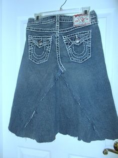 "This listing is for one of my line of Renaissance Denim Couture, where I upcycle denim and give it new life with French bohemian flair. This \"bohémienne\" jean skirt features a dark wash authentic True Religion denim skirt in a size 28 waist that I upcycled from vintage jeans. I frayed the edges and the hem for a funky boho vibe. This fraying will get even better with each wash! The size 28 waist of the Renaissance Denim Couture jean skirt has an actual measurement of 30\", with 38\" hips and Mermaid Cowgirl, Upcycle Denim, Denim Couture, Boho Mermaid, French Bohemian, Rose Jeans, Fairy Festival, Etsy Boutique, Bohemian Festival