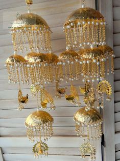 a gold chandelier hanging from the ceiling