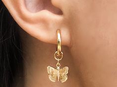 Trendy butterfly hoop earrings with micro CZ pave, gold plated 18k over brass. The charm is REMOVABLE from the earring and can be swapped for other charms. Earrings are slow tarnish and great for everyday wear. These cute earrings are comfortable and perfect for an everyday look. Listing is sold as a pair with either 2 earrings or 2 charms and made with love <3 Everyday Gold Plated Charm Earrings, Butterfly Charm Huggie Earrings As Gift, Adjustable Drop Earrings With Butterfly Charm, Butterfly Charm Hoop Jewelry Gift, Gift Butterfly Charm Huggie Earrings, Butterfly Charm Hoop Earrings As Gift, Trendy Hoop Earrings With Butterfly Charm As Gift, Gold Plated Hoop Earrings With Charms And Dangle Shape, Gold Dangle Butterfly Charm Jewelry