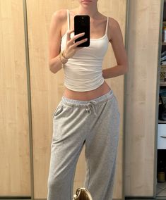 Loungewear aesthetic outfit inspo, sweatpants outfit, casual style inspo, boujee outfit, tank top Baggy Sweatpants Crop Top Outfit, Sports Bra Sweatpants Outfit, Tank Top Sweatpants Outfit, Sweatpants With Tank Top, Sweats And Tank Top Outfit, Aesthetic Outfits Sweatpants, Sweatpants Outfit Casual