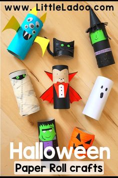 halloween paper roll crafts for kids on a wooden table with text overlay that reads, little doo com