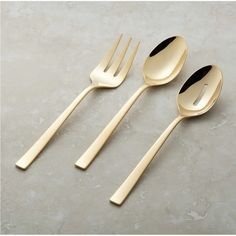 three forks and two spoons with black handles on a gray marble table top next to each other