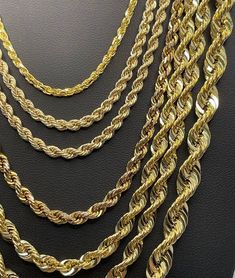 14k solid pure gold rope chain  type: Rope chain material: 14k pure gold  Our Pledge: 1. All items to be Brand New and authentic. 2. All gemstones to be 100% genuine and mined from the earth. 3. Jewelry guaranteed to be solid 10K / 14K / 18K 4. You will receive your order as shown. 5. Your order to be shipped, on time, as promised. 6. We will honor all policies, terms and conditions. 7. We offer the most competitive prices on-line Arrives within the Gift box and includes free shipping within the Luxury Rope Chain Necklace With Link Shape, Gold Plated Rope Chain Necklace, Luxury 14k Gold Necklace With Rope Chain, 14k Gold Rope Chain Luxury Necklace, Gold-tone Gold-plated Rope Chain Jewelry, Luxury Gold-tone Rope Chain Jewelry, Gold Rope Chains, Rolo Chain, Pure Gold