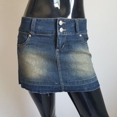 Distressed Denim Mini Skirt By Deb Jeans Never Worn All The Yellowish-Brown Colorings Are Part Of The Design Size 3 Please See Pictures For Measurements. Clothing Measurements Are Taken Laying Flat. Mannequin Measurements Are: Bust: 36 Inches Waist: 25.5 Inches Hips: 36 Inches Height (From Head To Heel): 66 Inches All Measurements Are Approximate. All Reasonable Offers Are Accepted. Thank You For Stopping By! Trendy Fitted Dark Wash Skort, Y2k Style Fitted Denim Skort, Fitted Cutoff Dark Wash Mini Skirt, Fitted Cutoff Dark Wash Denim Skirt, Fitted Cutoff Denim Mini Skirt, Fitted Denim Cutoff Mini Skirt, Fitted Distressed Medium Wash Mini Skirt, Stretch Denim Dark Wash Mini Skirt, Fitted Medium Wash Mid-rise Mini Skirt