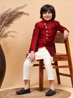 Vastramay boys maroon indo western jacket with cream kurta and pyjama set Long Sleeve Dabka Pant Set For Eid, Traditional Long Sleeve Pant Set With Zari Work, Long Sleeve Pant Set With Zari Work For Diwali, Diwali Long Sleeve Pant Set With Zari Work, Festive Long Sleeve Winter Sets, Bollywood Style Long Sleeve Pant Set For Eid, Bollywood Style Long Sleeve Pant Set For Festive Occasions, Festive Bollywood Long Sleeve Pant Set, Bollywood Style Long Sleeve Festive Pant Set