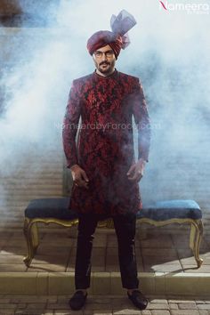 Red Sherwani Designer Long Sleeve Sherwani For Festive Occasion, Designer Long Sleeve Sherwani For Festivals, Designer Long Sleeve Sherwani For Eid, Red Sherwani For Men, Designer Long Sleeve Sherwani For Diwali, Designer Ceremonial Sherwani With Long Sleeves, Red Long Sleeve Bandhgala For Designer Wear, Designer Long Sleeve Sherwani For Ceremonial Occasions, Red Bandhgala With Dabka For Formal Occasions