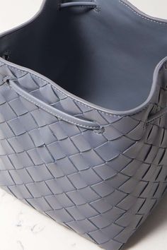 Gray Small embellished intrecciato leather bucket bag | BOTTEGA VENETA | NET-A-PORTER Bottega Veneta Bag, Bottega Veneta Bags, Bottega Veneta Intrecciato, Drawstring Top, Leather Weaving, Leather Bucket Bag, Leather Bucket, Grey Leather, White Bag