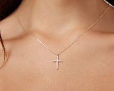 14K SOLID YELLOW GOLD DAINTY CROSS NECKLACE WITH DIAMONDS Here is a dainty, delicate and simple, yet classy minimalist Cross Necklace. This is 14k Solid Gold. (We do not sell filled or plated jewelry) Perfect for everyday use. Metal : 14K Solid Gold Necklace Length : 17 inches / 42.5cm Cross Height : 17.50mm Cross Width : 11.60mm Diamond : 14 Diamonds Each Diamond 1.5mm --- Nice White Color Sparkle Diamonds ---- G-H color SI2 clarity Total Carat: 0.21ct ---MADE IN USA--- ---Absolutely stunning. Classic Gold Diamond Cross Necklace, Gold Diamond Cut Cross Necklace, Cross Necklace With Single Cut Diamonds, Gold Cross Pendant Diamond Necklace With Single Cut, Cross-shaped Yellow Gold Diamond Necklace, Layering Diamond Necklaces, Diamond Cross Necklace Gold, Dainty Cross Necklace, Solid Gold Necklace