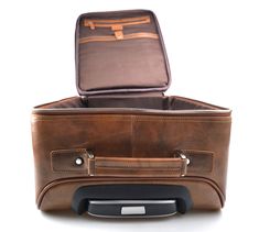 Luggage leather carry on travel bag weekender bag overnight leather bag with 4 wheels brown leather cabin luggage airplane carry on bag Item details: Outside: Materials: Genuine Italian hand-buffed calf leather. Best vegetable tanned leather making our handbags the most durable and weather resistant. Feet 360 o swivel wheels Retractable telescopic handle Front pocket Inside: Cotton lining 1 compartment Multifunction pockets Zip closure Metal Accessories Leather handle Size: Length x Height x Wid Brown Cases With Luggage Sleeve For Trip, Brown Luggage With Leather Lining For Trips, Brown Luggage With Luggage Sleeve For Travel, Brown Luggage With Sleeve For Weekend Trips, Brown Luggage For Weekend Trips With Sleeve, Brown Rectangular Luggage With Sleeve, Rectangular Brown Luggage With Sleeve, Brown Leather Luggage With Luggage Sleeve For Trip, Brown Luggage With Sleeve For Trips