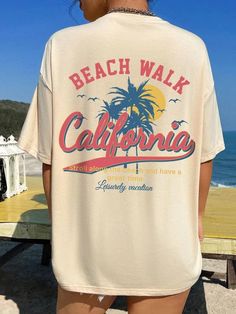 California Dreams Beach Walk Vintage Back-Print T-Shirt – True to You Retro Surfing T-shirt For Beach Season, Retro Summer T-shirt With Slogan, Retro Letter Print T-shirt For Beach Season, Vintage Printed T-shirt For Vacation, Retro Text Print T-shirt For Beach, Relaxed Fit T-shirt With Back Print For Summer, Summer Graphic Tee With Back Print, Retro T-shirt With Back Print For Summer, Vintage Summer Beach T-shirt