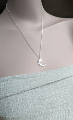 Sterling Silver hammered crescent moon and shiny star necklace. The moon is Hand-forged hammered and polished and finally a little polished star added to this cute necklace.  All elements are 925 recycled sterling silver. This comes on a 925 sterling silver trace chain. Moon measures  2 cm, Star 8 mm. Small Moon and Star necklace 1.5cm.  https://www.etsy.com/uk/listing/1312368828/moon-and-star-necklace-hammered-moon Hammered double star necklace https://www.etsy.com/uk/listing/483228606/hammered Silver Moon-shaped Jewelry Gift For Her, Sterling Silver Moon Charm Necklace For Her, Sterling Silver Moon Charm Jewelry Gift For Her, Elegant Silver Hammered Charm Necklaces, Elegant Silver Hammered Charm Necklace, Crescent Sterling Silver Necklace Gift, Sterling Silver Crescent Necklace For Gift, Hammered Moon-shaped Jewelry As Gift, Hammered Moon-shaped Jewelry For Gifts