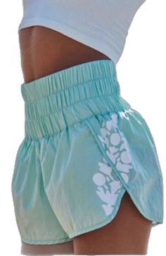 Light Blue Beachwear Shorts For Spring, Turquoise Shorts For Beach, Turquoise Vacation Shorts, Turquoise Short Bottoms For Vacation, Stretch Turquoise Summer Shorts, Casual Turquoise Stretch Shorts, Turquoise Stretch Casual Shorts, Turquoise Stretch Shorts For Casual Wear, Casual Turquoise Summer Shorts