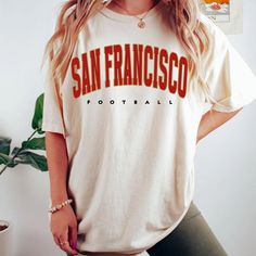 "comfort colors San Francisco Football shirt, San Francisco Football Shirt, Retro San Francisco Football Shirt, San Francisco Football Gift -Please check Color and Size Charts before placing the order. You can find them in the listing's photos (Depending on what device you are viewing this listing colors may vary slightly). -Returns and exchanges are accepted only if there are defects \"No Extra Costs\" We create custom t-shirts with great designs for everyone's liking. If you don't find the size or color you would like, please message us and we will be happy to  accommodate! comfort colors San Francisco Football shirt, San Francisco Football Shirt, Retro San Francisco Football Shirt, San Francisco Football Gift PRODUCT T-shirt Comfort Colors® 1717     Medium fabric (6.1 oz/yd² (206.8 g/m Casual Summer Shirt For Game Day, Casual Relaxed Fit Shirt For Game Day, Retro San Francisco, Vintage San Francisco, Football Gift, Retro Men, Football Gifts, Gift Product, Football Shirt