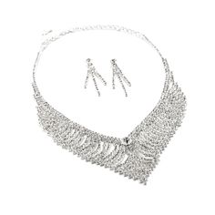 This bridal wedding jewelry set is simply stunning! This beautiful jewelry set is encrusted with clear, sparkling rhinestones in a sophisticated and elegant design. The necklace measures approximately 12" long with a 5" extender Chain for just the right fit. The matching Earrings measure approximately 1.5" long and 1.7g in weight. This set is perfect for brides, bridesmaids, pageants or any special event. This set coordinates with any color or style wedding dress or formal ensemble. Party Crystal Bridal Sets With Rhinestones, Silver Bridal Sets With Rhinestones For Party, Silver Rhinestone Fringe Necklace For Wedding, Dazzling Diamond White Jewelry Sets With Rhinestones, Glamorous Crystal Jewelry Sets With Rhinestones, Wedding Jewelry Sets With Rhinestones And Dangle Earrings, Silver Wedding Jewelry With Rhinestone Fringe, Formal Crystal Jewelry With Rhinestone Fringe, Wedding Jewelry With Rhinestone Fringe In Crystal