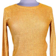 Beautiful Weave Of Gold Polyester And Elastane Creates This Simple, Elegant Cropped Sweater/Top By Zara. Size S Measurements Laying Flat: Pit To Pit = 16” Shoulder Top To Hem Bottom = 17” Sleeves = 23” Condition: New, Never Worn, Original Tag Holder In Place, But Tags Not. Always - Automatic 25% Off For Purchasing 3 Or More Items!! Fitted Gold Sweater For Spring, Gold Stretch Blouse For Fall, Zara Gold Tops For Spring, Zara Stretch Knit Top With Long Sleeves, Zara Stretch Pointelle Knit Tops, Gold Stretch Long Sleeve Tops, Zara Gold Party Tops, Zara Textured Knit Stretch Tops, Zara Stretch Long Sleeve Knit Top