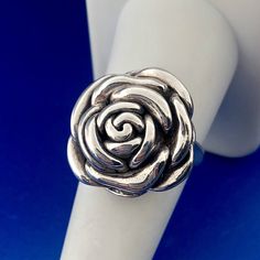 * Fun 925 Sterling Silver Textured Rose Camellia Flower Fashion Ring * Ring size: 8.75 * Top of ring measures: 7/8" x 7/8" * Band Width: 1/8" * Height: 1/4" * Weight: 5.6 g * Marked: 925 * Condition: Great. (225bluetopdupboxbr) * S1148    Exported By ExportYourStore :) Formal Flower Shaped Rings With Rose Design, Formal Flower-shaped Ring With Rose Design, Formal Rose Flower Shaped Rings, Formal Rose Flower Rings, Formal Flower Shape Rose Design Ring, Formal Flower-shaped Rose Design Ring, Formal Rose Colored Flower Shaped Rings, Silver Rings With Rose Design For Formal Occasions, Flower Shaped Rose Ring For Anniversary