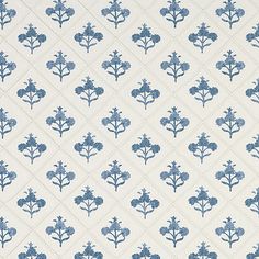 a blue and white wallpaper with flowers on it