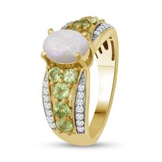 Take your look to the next stylish level with the regal design of this oval-shaped opal and peridot with white lab-created zircon triple-row ring. Fashioned in sterling silver with 14K gold plate Multi-sized spring-green peridot flank the 8.0 x 6.0mm oval-shaped iridescent opal cabochon. Tapered ribbons of white lab-created zircons shimmer along the borders of the shank. Oval Multi-stone Peridot Gemstones, Oval Opal Ring For May Birthstone, Regal Design, White Lab, Green Peridot, Spring Green, The 8, Borders, Sterling Silver Rings