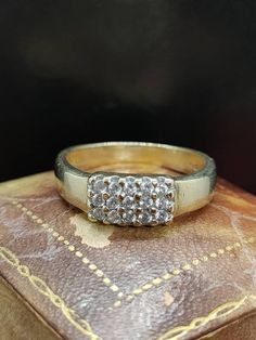 This beautiful vintage ring has amazing style featuring sparkling cubic zirconia gemstones set in 9ct yellow gold  UK size - M US size - 6.25 Message me any questions Classic Gold Sparkling Rings, Vintage Gold Diamond Ring With Vvs Clarity, Classic Hallmarked Cluster Ring With Cubic Zirconia, Classic Sparkling Diamond Ring As Gift, Sparkling Yellow Gold Diamond Ring For Formal Occasions, Gold Sparkling Anniversary Rings, Gold Sparkling Rings For Anniversary, Sparkling Gold Rings For Anniversary, Formal Yellow Gold Sparkling Diamond Ring