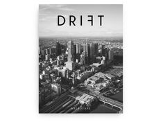 a black and white photo of a city with the words drift in front of it