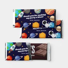 two chocolate bars with space theme on them