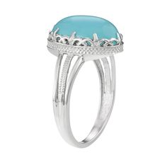 Featuring a lustrous blue chalcedony cabochon, this sterling silver oval fashion ring offers bold style. Click on this JEWELRY & WATCHES GUIDE to learn about fit, styles, materials and more!RING DETAILS Width: .61 in. Metal: sterling silver Plating: rhodium STONE DETAILS Stone type: blue chalcedony Total weight: 7 ct. Center stone size: 14 mm x 10 mm Shape: oval cabochon Setting: prong Gemstones may have been treated to enhance their appearance. Special care may be required. Please visit our Gem Elegant Polished Turquoise Ring, Elegant Blue Oval Cabochon Moonstone Ring, Classic Rings With Oval Cabochon Gemstone Accents, Elegant Turquoise Ring With Polished Finish, Formal Blue Oval Cabochon Moonstone Ring, Classic Silver Oval Turquoise Ring, Classic Oval Blue Moonstone Ring, Elegant Oval Cabochon Turquoise Ring For Formal Occasions, Elegant Oval Cabochon Turquoise Ring For Formal Events