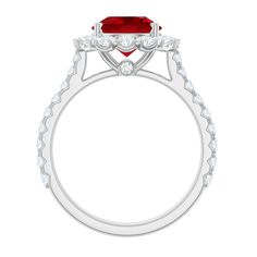 a red diamond ring with white diamonds on the sides and an oval shaped center stone