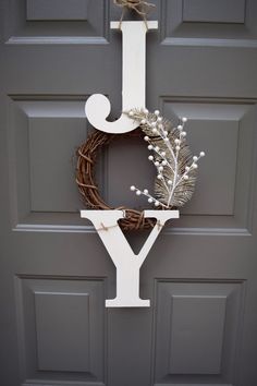 a door with a wreath and letter y on it