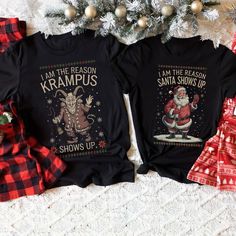 *EACH SHIRT SOLD SEPARATELY* - *PANTS NOT INCLUDED*  Celebrate the holidays in style with our "Krampus vs. Santa" Couples Christmas Shirts! Perfect for couples who love to add a bit of fun to their festivities, these matching tees are a playful way to show off your unique holiday spirit. Whether you're lounging by the fire, hosting a holiday party, or taking cozy Christmas photos together, these shirts are sure to be a hit. With one declaring "I Am the Reason Krampus Shows Up" and the other "I Am the Reason Santa Shows Up," you and your partner can enjoy some lighthearted fun while staying comfy and festive all season long! Available in plus sizes. Order yours today! All of our shirts are custom made to order. ► SHIRT DETAILS: * Classic unisex crew neck short sleeve  * Bella Canvas brand * Couples Xmas, Couples Christmas Shirts, Pajamas Shirt, Xmas Couple, Christmas Shirt Funny, Xmas Pajamas, Couples Christmas, Matching Christmas Shirts, Funny Holiday