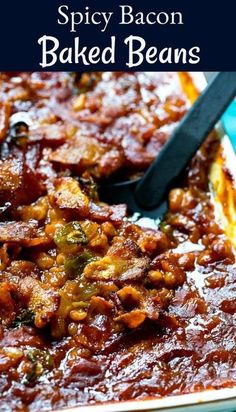 a bowl filled with baked beans and topped with a spoon