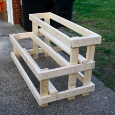 two wooden benches sitting next to each other