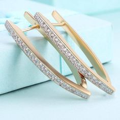 Earring Type: Hoop EarringsItem Type: EarringsFine or Fashion: FashionStyle: TrendyShape pattern: GeometricMetals Type: CopperMaterial: Cubic ZirconiaSize (Length * Width): 3.7*0.3Material: Copper + AAA Austrian Cubic ZirconiaEco-Friendly: Lead & Nickel Free Pearcing Ear, Peircings Earring, What Earrings To Wear, Ear Peircings, Ear Ideas, Earring Bridal, Piercings Ear, Ear Piercing Ideas, Earrings Outfit