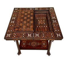 a wooden table with intricate designs on it