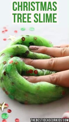 a person's hand with green christmas tree slime on it and the text overlay reads, how to make homemade christmas tree slime slime