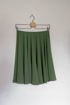 Ready for that ballet class? Our classic, green tea -colored ballet skirt is exactly made for that! This ballet dress is handmade with a stretchy elastic waistband for a comfortable experience. Crafted 100% out of polyester chiffon with a right above the knee design for a vintage look. ✷ Perfect for Recital ✷ This green color ballet dress is the perfect choice for a vintage/classy-style recital. A conservative style with a right above the knee design for a formal performance. Not only that, this Elegant Green Flowy Skirt, Elegant Flowy Green Skirt, Green Full Cotton Skirt, Green Full-length Flowy Skirt, Green Ballet Skirt, Conservative Style, Night Costume, Ballet Skirts, Fabric Steamer