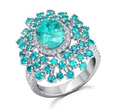 High End Jewelry - Diamond and Paraiba Tourmaline couture ring by award winning fine jewelry designer Graziela. Exclusive fine jewelry design available at Ethos of London - Contemporary Fine Jewelry Neon Blue Color, Paraiba Tourmaline Ring, Contemporary Fine Jewelry, Paraiba Tourmaline, Tourmaline Jewelry, Jewelry Designers, Argentium Silver, Couture Jewelry, Fine Jewelry Designers