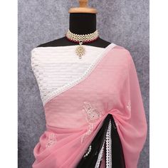 Pink & Black colored saree is made from georgette fabric which is highlighted with beautiful sequin embroidered work as shown. Comes along with unstitched sequins embroidered georgette blouse piece which you can customise as per your design/style. Occasion - You can wear this saree for party and functions. Note:- the actual product may differ slightly in color and design from the one illustrated in the images when compared with computer or mobile screen. Measurements: Saree : Georgette : 5.5 Mtr Pink Pre-draped Saree With Embroidered Border In Georgette, Pink Georgette Pre-draped Saree With Embroidered Border, Pink Embroidered Sequined Saree Fabric, Pink Embroidered Georgette Saree, Semi-stitched Black Georgette Saree, Georgette Blouse, Georgette Fabric, Georgette Sarees, Black Sequins