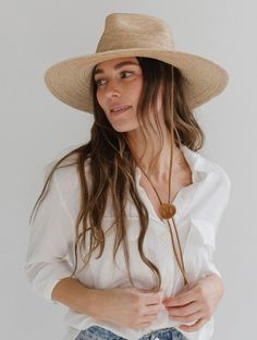 The exceptional straw for whatever the day might bring. The River is a straw hat with teardrop fedora crown featuring a flat brim trimmed with a leather chinstrap + leather slider. Crafted with exotic Guatemalan Palm Straw and hand shaped in Texas, USA. Style - Teardrop Lifeguard Material - Guatemalan Straw Dimensions - Crown 10.5 cm + Brim 10.5 cm Colors- Ivory and Oak Gigi Pip, Womens Straw Hats, Pork Pie Hat, Native Shoes, Halo Style, Wearing A Hat, Find Color, Texas Usa, Loungewear Sets